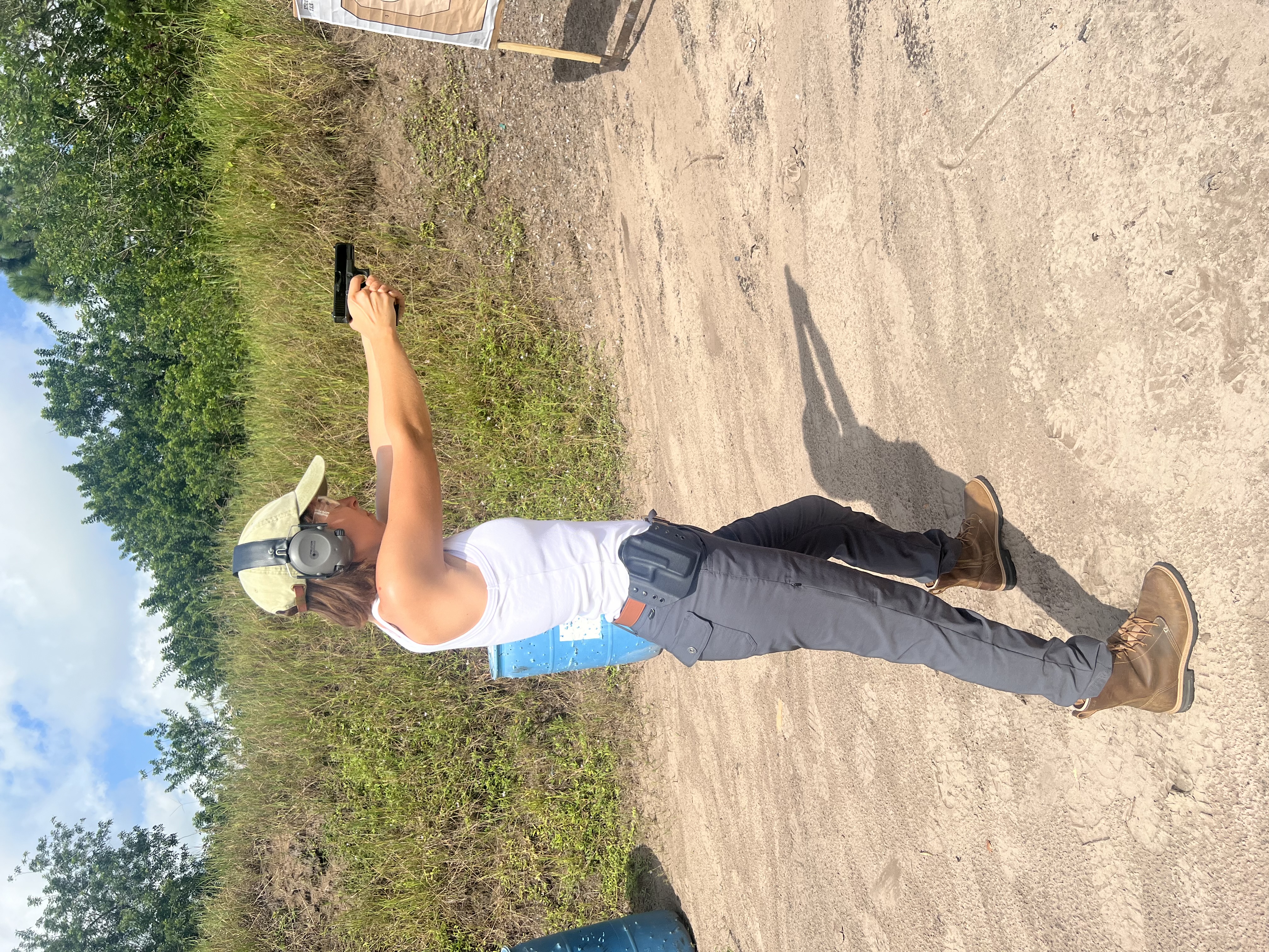 Student practicing pistol fundamentals during a private firearms training session